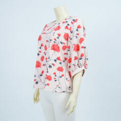 เสื้อคอกลม แขนพอง ปลายแขนมุมสามเหลี่ยม ผ้าลายดอกไม้ - Image 2