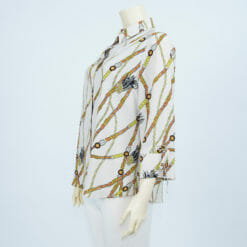 เสื้อคอปก แขนกระบอก แต่งผ้าผูกโบว์ ผ้าลายกราฟิก - Image 2