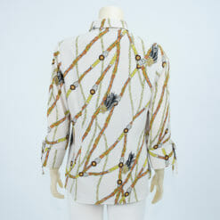 เสื้อคอปก แขนกระบอก แต่งผ้าผูกโบว์ ผ้าลายกราฟิก - Image 3