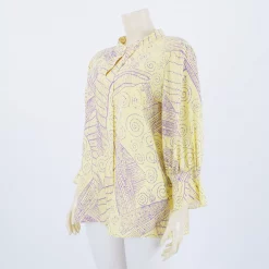 เสื้อคอตั้ง แขน 4 ส่วน ปลายแขนระบาย ลายกราฟิก - Image 3