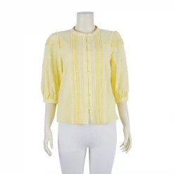 เสื้อคอกลม  แขนพองยาว 4 ส่วน  ผ้าทอลาย 3 มิติ