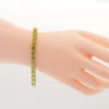 ซี เอ จิวเวลรี่ สร้อยข้อมือเงิน925  ชุบทอง18K ประดับเพริดอต