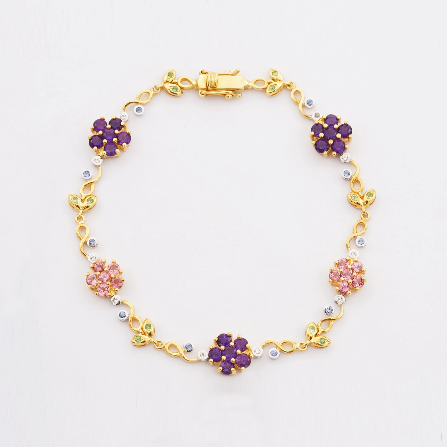 พนา คอลเลคชั่น สร้อยข้อมือเงิน925 ชุบทอง18K ดีไซน์ดอกไม้ ประดับอัญมณีหลากชนิด