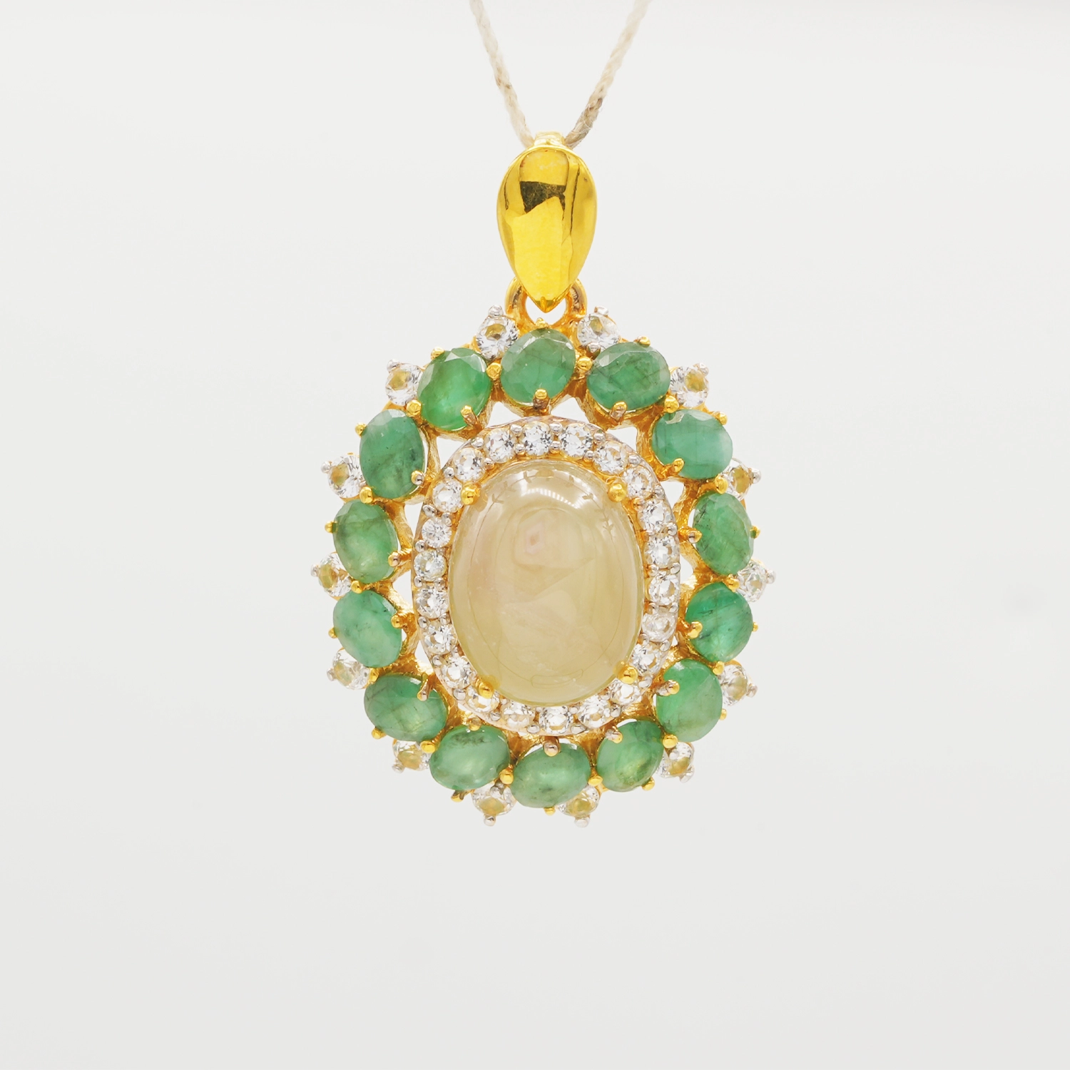 เนตรไอริน จี้เงิน925 ชุบทอง18K ประดับทับทิมสีงาช้าง, มรกต และโทแพซสีขาว