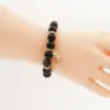 ลักษ์ มงคล สร้อยข้อมือออปซิเดียน และฮีมาไทต์ ติดจี้ดอกรัก