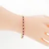 กลิทซ์ จิวเวล กำไลเงิน925 ชุบทอง18K ประดับแอเมทิสต์ และเซอร์คอนสีขาว