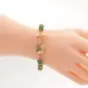 ลักษ์ มงคล สร้อยข้อมือเบริลสีเขียว และฮีมาไทต์
