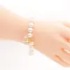 ลักษ์ มงคล สร้อยข้อมือมุกน้ำจืด ตกแต่งจี้น้ำเต้า