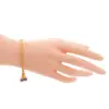 มณีเงิน สุโขทัย สร้อยข้อมือเงิน99.9% ถักสี่เสาห้อยจี้ถุงเงิน ลงยา ชุบทอง